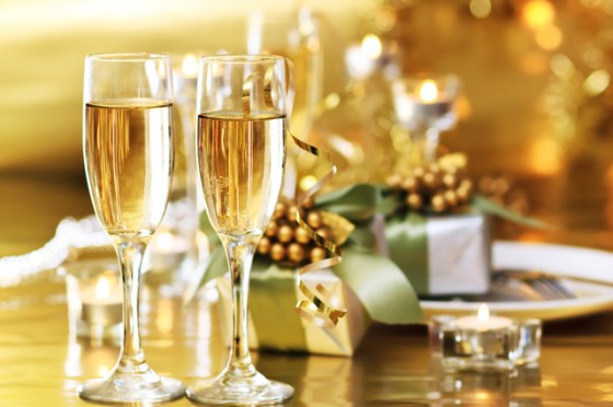 Two champagne glasses on dinner table